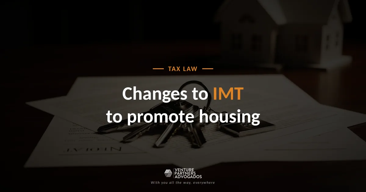 Model house on top of documents and floor plans, illustrating the changes to IMT aimed at promoting the supply of housing